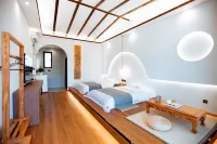 Guyue Chinoiserie Homestay Hotels in Кюнес