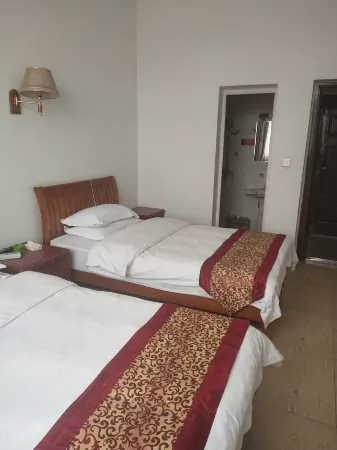 Yaxin Hotel (West Ring Road) Отели рядом с достопримечательностью «Longquan Park»