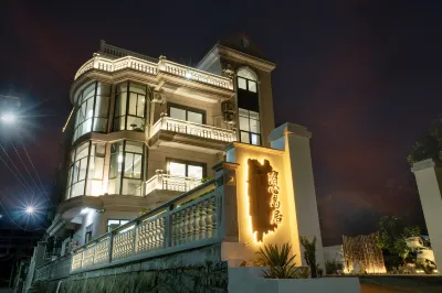 Meizhoudao Poxin Daoju Homestay (Huangjin Shatan) Hotels near Reclining Buddha of the East Sea