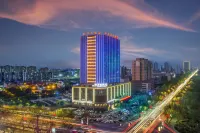 Minghua Hotel (Aksu Tianbai Fashion Shopping Center Xinglong Underground Street Branch)