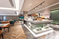 New Century Hotel Xihu Nanchang (Nanchang Bridge East Subway Station) - بار