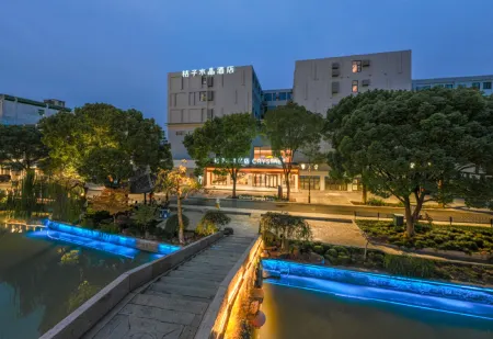 Crystal Orange Hotel Jiaxing Pinghu Отели рядом с достопримечательностью «Jiaxing University Pinghu Campus»