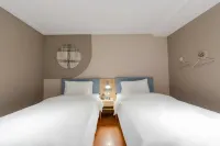 홈인 · neo (상하이 신장 지하철역 남쪽 광장) 룽청/용성 센트럴공원 주변 호텔