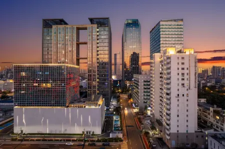 Licheng Langyu Hotel (Binhu Vientiane Hui,Yuantouzhu Scenic, Wuxi) Отели рядом с достопримечательностью «Basic Teaching Department of Wuxi Institute of Commerce»