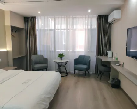 Qiqi Hotel (Longnan High-Speed Railway Station First People's Hospital) Hotels in Longnan