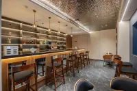 Mingdu Flower Half Open Hot Spring Resort Hotel - bar