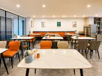 Home Inn Yubai Yun Hotel (Zhangjiagang Jingang Central Plaza) - ห้องครัว