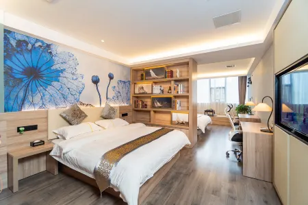 Yijia Business Hotel (Xincheng) Отели рядом с достопримечательностью «Wolong Academy»