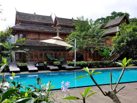 Xishuangbanna Nanshanyin Chayuanli Guesthouse Отели в г. Менхай