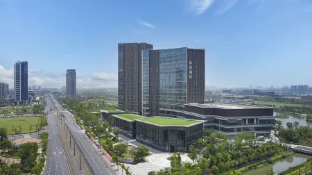 Hyatt Regency Shanghai Songjiang Отели рядом с достопримечательностью «Shanghai International Studies University (Wenxiang Road)»