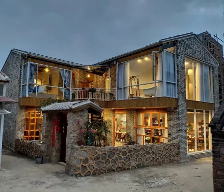 Xingru Xiaoyuan Boutique Homestay Отели рядом с достопримечательностью «Hailing Island National Wetland Park of Mangrove Forest»