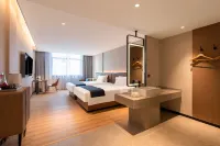 Echarm Hotel (Zhaoqing Sihui Tianguangxu Market) فنادق في سى خوي