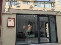 Kaifeng Youfeng Xiaoyuan Homestay (Wansui Mountain Song Dynasty Wuxia City Branch) Hotels near Liuyuankou Passenger Transport Terminal