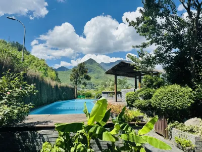 倚天居（天荒地老）山野リゾート民宿 安吉荷花山漂流サービスステーション周辺のホテル