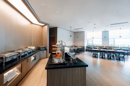 Hanting Hotel Guiyang Huaxi Shili Hetan Wetland Park Branch Отели рядом с достопримечательностью «Guizhou Aviation Vocational and Technical College»