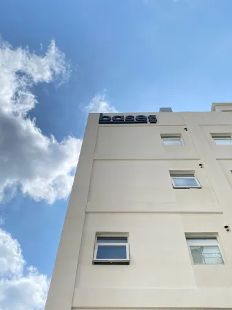 baseLITE-W.LONGHUA Serviced Apartment Отели рядом с достопримечательностью «Shanghai Normal University (Haicheng Road)»