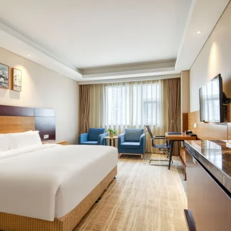 Qingdao Airport Fuhua Hotel (Hong Kong Middle Road May Fourth Square) Отели рядом с достопримечательностью «Олимпийский парусный центр»