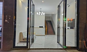Libo Xiaoqikong Hejiahuan Inn