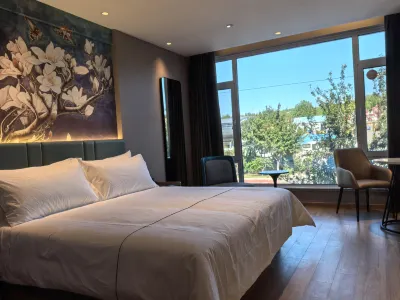 Magnolia Hotel Hotel di Pingyin