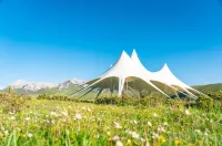 Yungu Huahai Camping Hotel (Gaxiu Yungu Scenic Area) فنادق في لوتشو