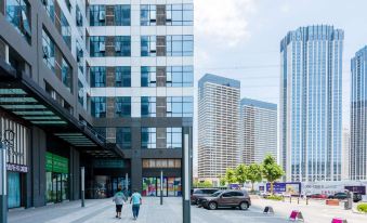 Xinghai Square Zexi Meitu Hotel (Exhibition Center Subway Station Branch)