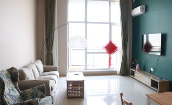 Blue Luxury Impression Apartment (Yingkou Wanda Plaza Zhongtian International Branch)