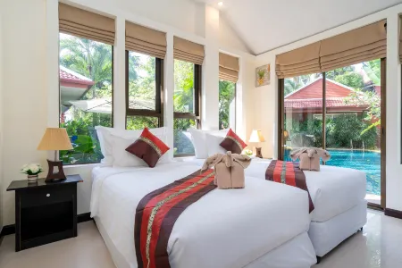 Boutique Resort Private Pool Villa Отели рядом с достопримечательностью «Road Runner Buggy and ATV Adventure Phuket»