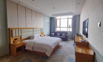 Longxin Hotel (Shihezi 147 Tuanshihutan Branch)