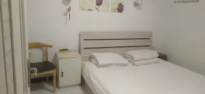 Qiqihar Dadi Hotel Hotel dekat Longsha Zoological and Botanical Gardens