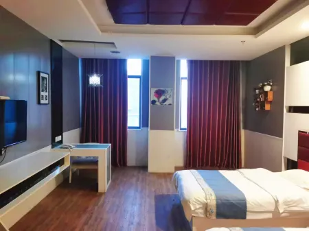 Huayi E-sports Hotel (Fengxian Bus Station) Отели в г. Фэнсянь