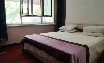 Mudan Jiangxin Clock Express Hotel (Heilongjiang Vocational College of Commerce East Campus Shop)