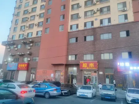 Haicheng Xingfuli Homestay Отели рядом с достопримечательностью «Kuixing Building»