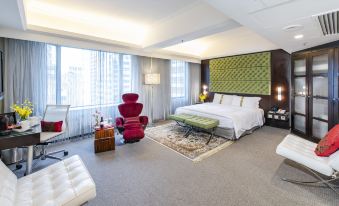 large windows, providing a scenic view of the ocean at Empire Hotel Hong Kong－Wan Chai