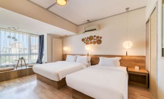 Yike Yijia Theme Apartment (Dalian Gaoxin Wanda Plaza)