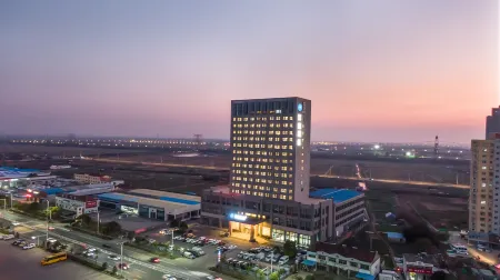 Hanting Hotel (Funing Bus Station) Отели рядом с достопримечательностью «Yancheng Kangji 623 Teda Longjuanfeng Memorial Hall»