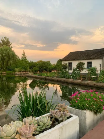 Greenhouse House inn Отели рядом с достопримечательностью «Shanghai Puji Bridge»