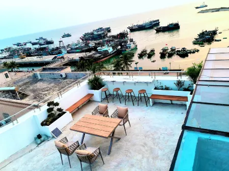 Zhanjiang Jianyi Seaview Homestay Отели рядом с достопримечательностью «Naozhou Lighthouse»