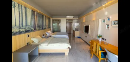 Wuchuan Coastline Apartment Отели рядом с достопримечательностью «Loong Bay International Ocean Resort»