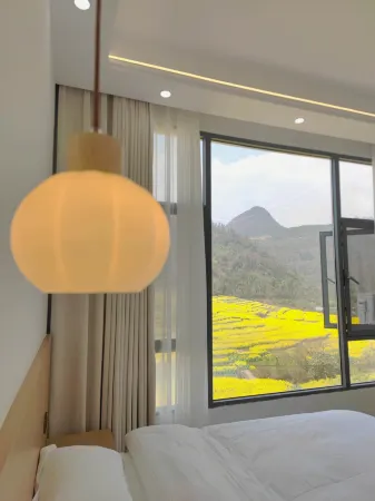 Luoping Shanshui Courtyard Отели рядом с достопримечательностью «Jiulong Waterfalls»