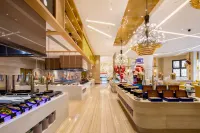 Zhengzhou Yinji Ice and Snow Hotel - فطور