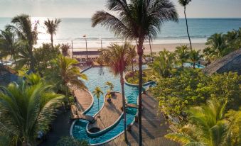 The balcony at a beach resort and spa in Koh Samui offers a scenic view at Aureum Palace Hotel & Resort Ngapali