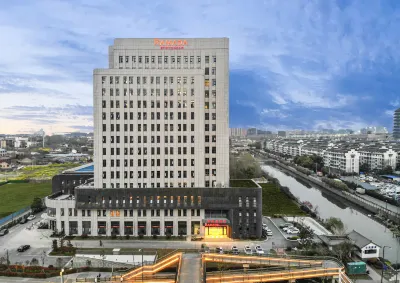 Yangzhou  Ramada Wenchang Pavilion Hotel Отели в г. Янчжоу