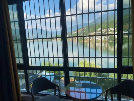 Panzhihua Wangyue Lake Hotel Отели в г. Яньбянь