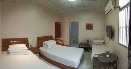 Xingping Sunshine Hotel Отели в г. Синпин