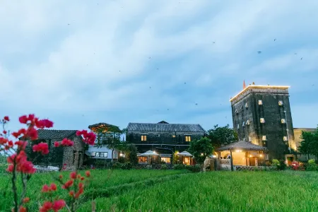 Taishan Wanggang Diaolou Homestay Отели рядом с достопримечательностью «Xincun Gymnasium»