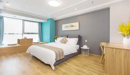 Aiyi Future Serviced Apartment (Shenyang Qingnian Street Maoye Center Branch) Отели рядом с достопримечательностью «Shenyang Science Palace»