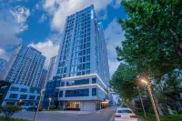 Orange Hotel (Rizhao Huarun Vientiane Mall Rizhao Railway Station Branch) Hotel di Rizhao Municipal Government (Pusat kota baru)