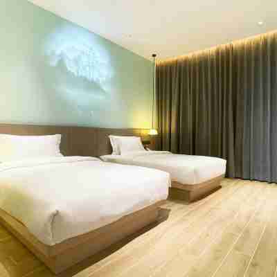 笆笆拉酒店(玉林興業高鐵站人民廣場店) Rooms