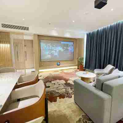 笆笆拉酒店(玉林興業高鐵站人民廣場店) Rooms