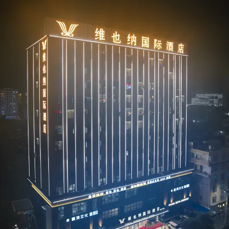Vienna International Hotel (Zhaotong Wuyue Plaza) Отели в г. Чжаотун